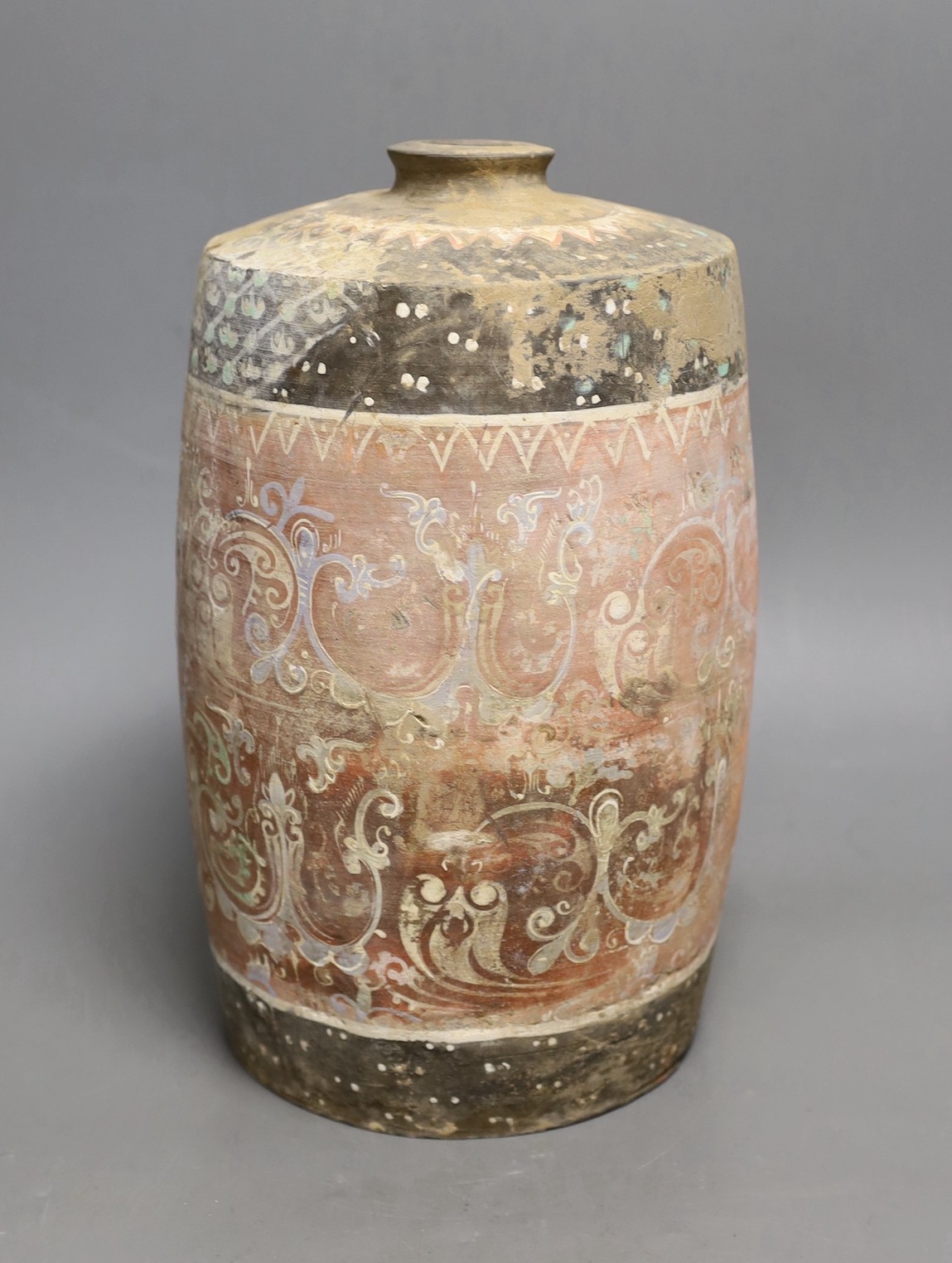 A Chinese pigment painted grey pottery jar, Han dynasty (200BCE - 220CE), 29cm high